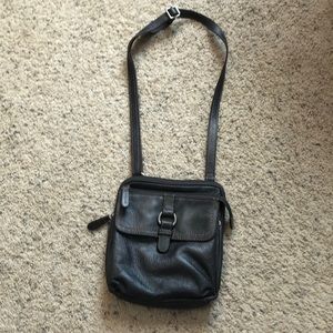 Brown leather fossil purse.